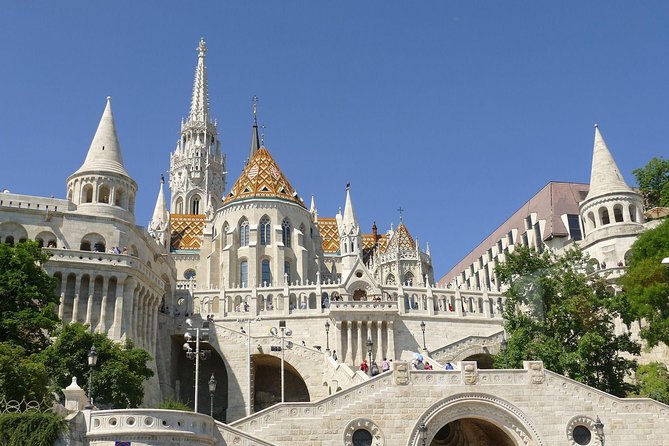 Buda Castle Private Walking Tour: A Kingdom of Many Nations - Matthias Church: decorated roof, Neogothic interior, and ticket timing