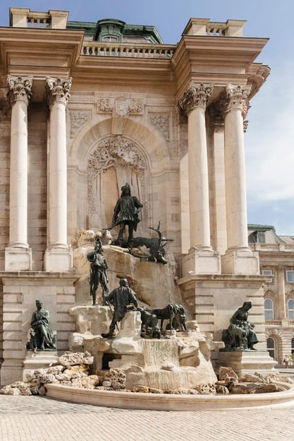 Budapest: Buda Castle Walking Tour & Folk Music Performance - Starting at Holy Trinity Square, you get your bearings fast