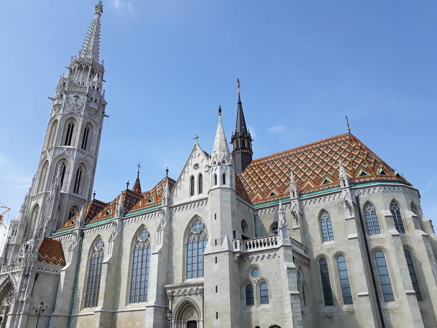 Budapest: Buda Castle Walking Tour & Folk Music Performance - Tárnok Street, the architectural timeline you can actually walk