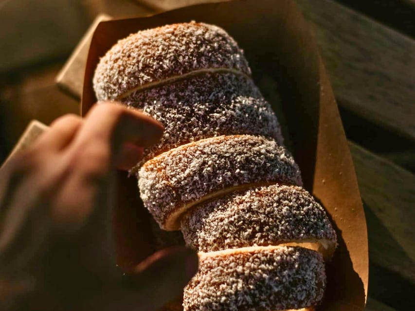 Budapest: Chimney Cake Workshop in City Park - The topping moment: sugar, coconut, or cinnamon after baking