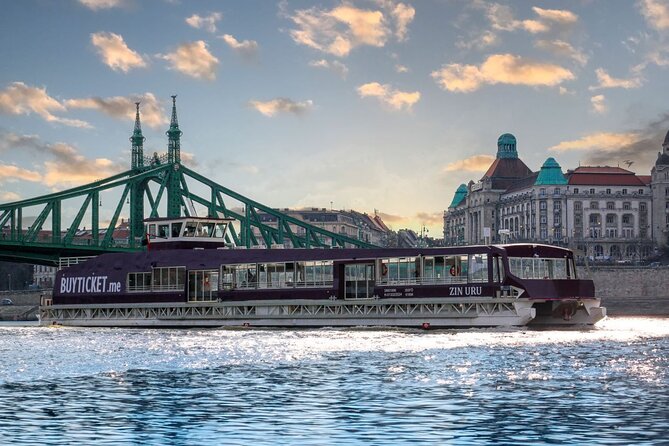 Budapest Danube 1 Hour Sunset or Night Cruise with Audio Guide - Liberty Bridge and Hotel Gellert: The Danube Keeps Scanning the City