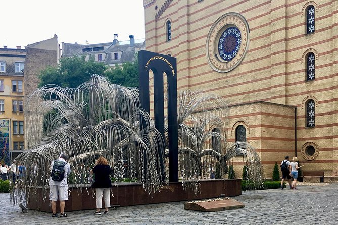 Budapest Jewish Heritage: Synagogues, Shoes, Secrets & Flódni - Entering the Jewish Quarter: Herzl Square to Dohány Street