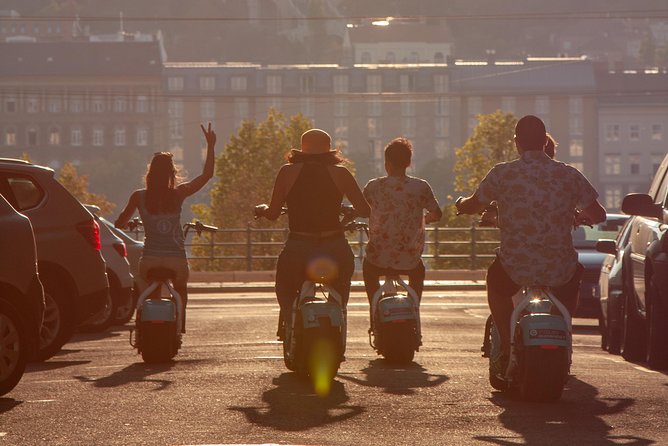 MonsteRoller E-Scooter Rental in Budapest - Weather Gear: Rain Poncho, Warm Gloves, and Dress Smart